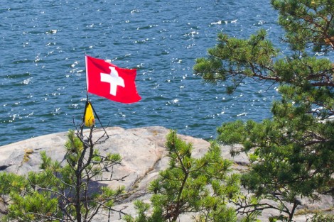 My Swiss flag on a rock in front of the mökki during last year's Saaristo XQ.